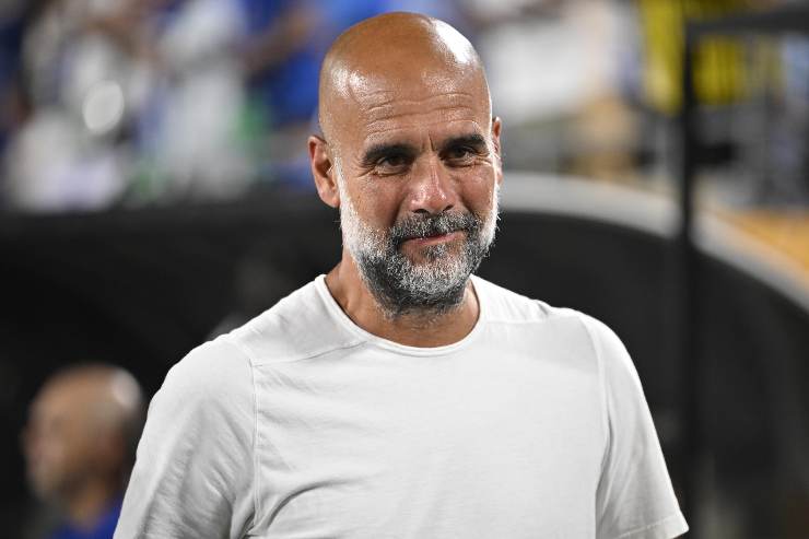 Pep Guardiola sorride